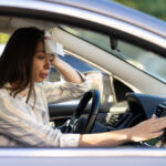 Exhausted,Young,Woman,Suffering,From,Heat,Inside,Car,With,Broken