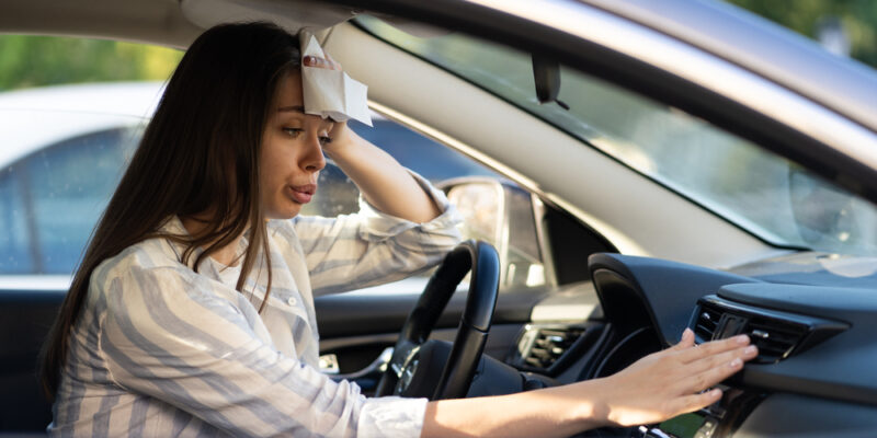 Exhausted,Young,Woman,Suffering,From,Heat,Inside,Car,With,Broken